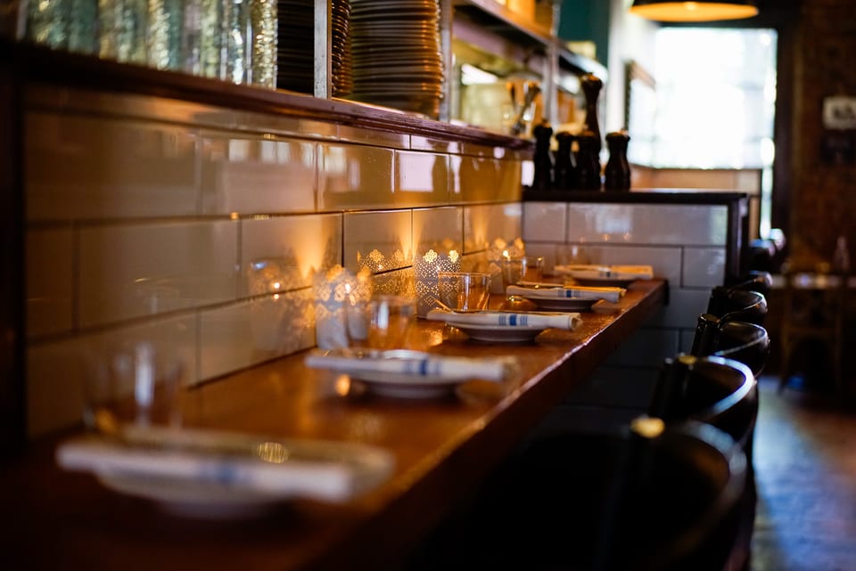 Candlelit oyster bar for private events at Ferris' Upstairs, Victoria BC
